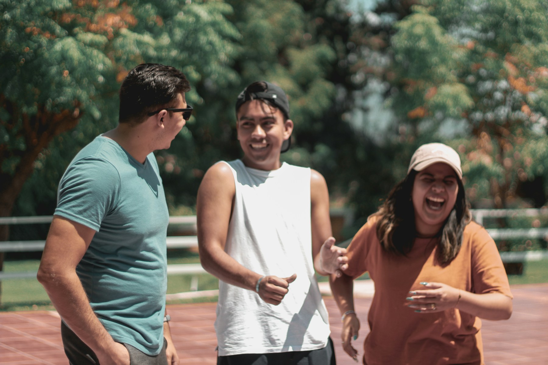 Friends laughing together outdoors
